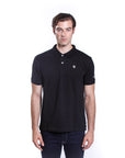 Piqué polo shirt with embroidery on the sleeve