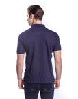 Piqué polo shirt with special cut and embroidery on the sleeve
