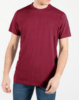 T-shirt in jersey con logo ricamato ton sul ton al lato cuore