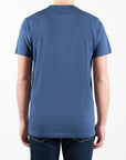 T-shirt badge con stampa centrale