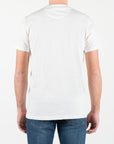 T-shirt con con ricamo centrale e dettaglio della bandiera americana intarsiata sulla manica sinistra