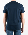 T-shirt con con ricamo centrale e dettaglio della bandiera americana intarsiata sulla manica sinistra
