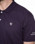 Piqué polo shirt with embroidery on the sleeve