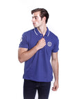 Solid color pique polo shirt with contrasting embroidery