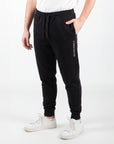 Pantalone felpato in pile con patch della bandiera americana cucita sulla tasca posteriore