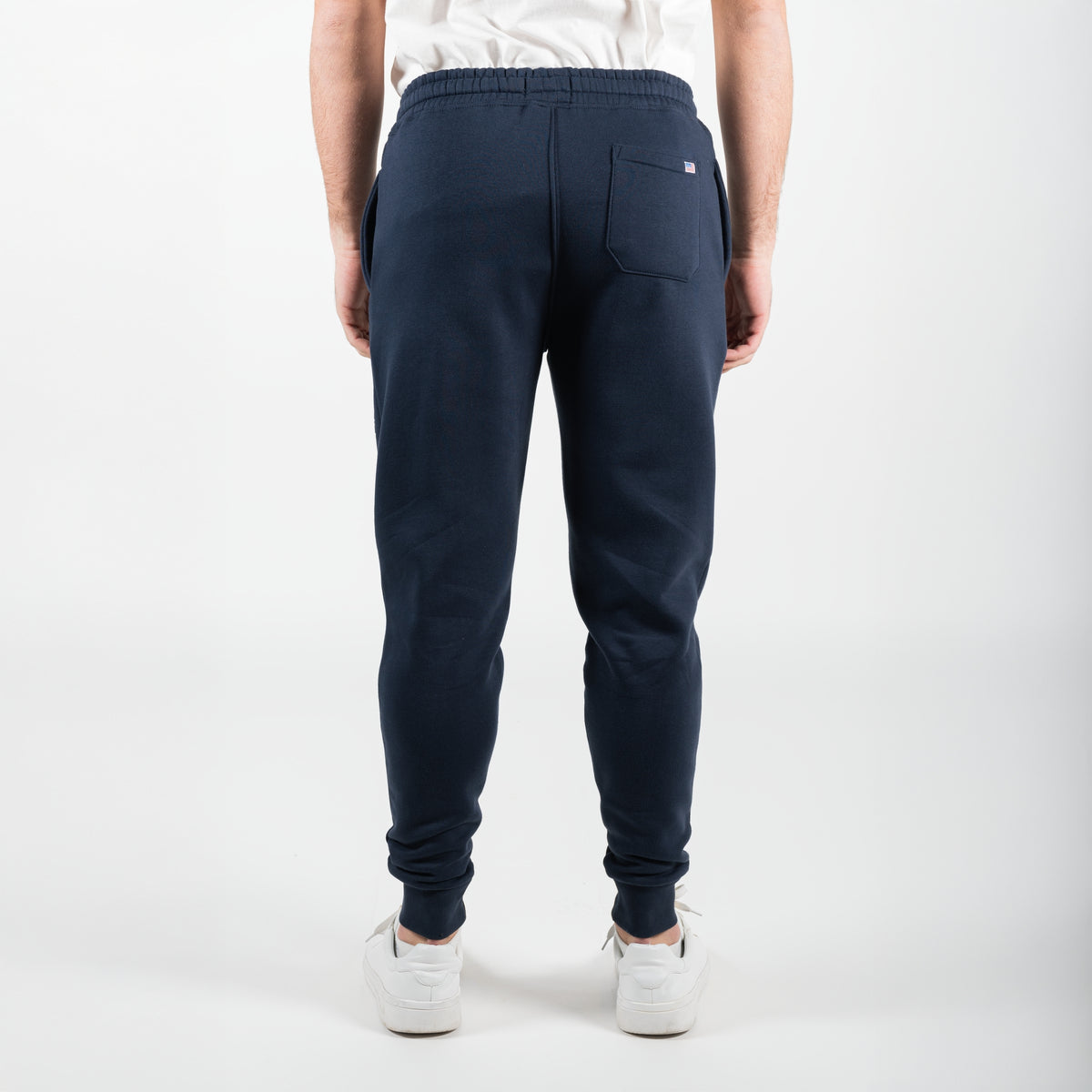 Pantalone felpato in pile con patch della bandiera americana cucita sulla tasca posteriore