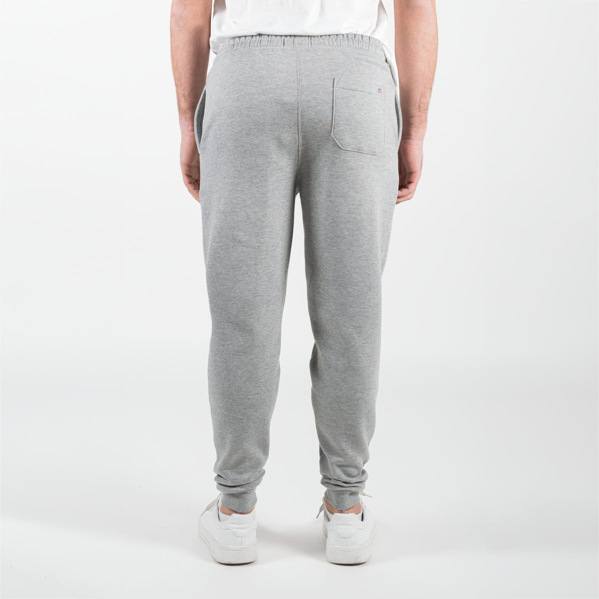 Pantalone felpato in pile con patch della bandiera americana cucita sulla tasca posteriore