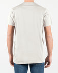 T-shirt in jersey con logo ricamato ton sul ton al lato cuore
