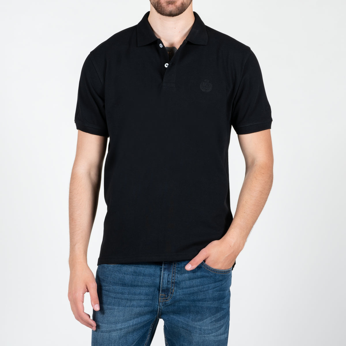 Polo in piquet con logo ricamato tono su tono lato cuore