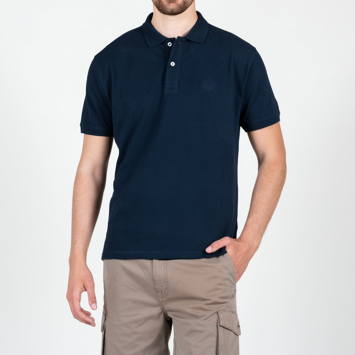 Polo in piquet con logo ricamato tono su tono lato cuore