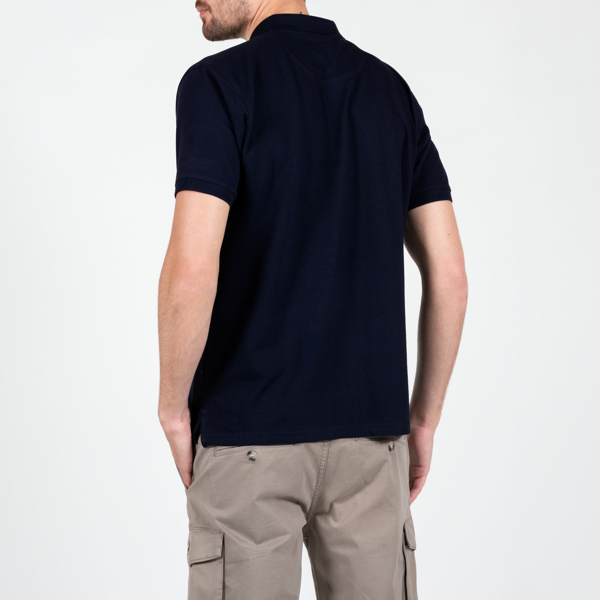 Polo in piquet con contrasto centrale