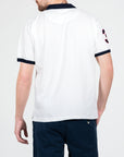 Polo in piquet bianca con colletto a contrasto