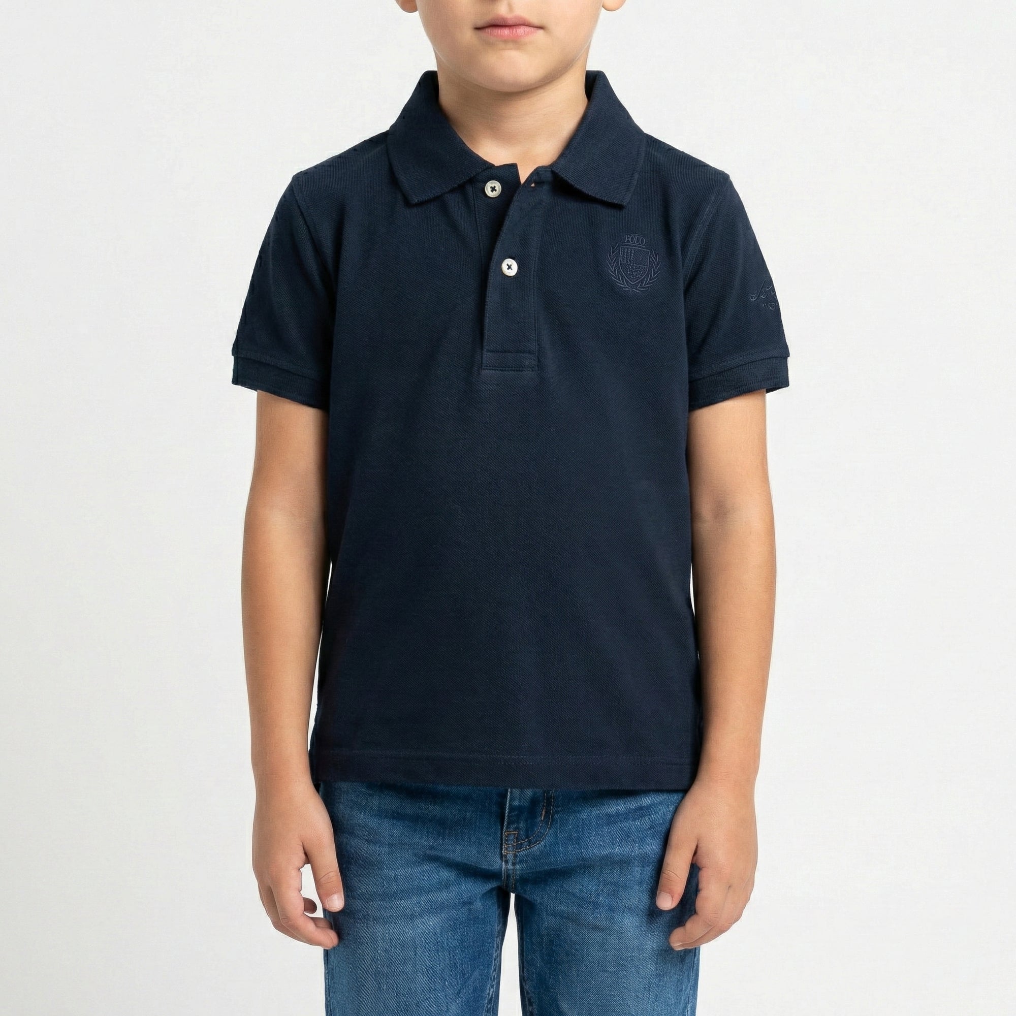 Polo in piquet con logo ricamato sul lato cuore e collo con riga a intarsio