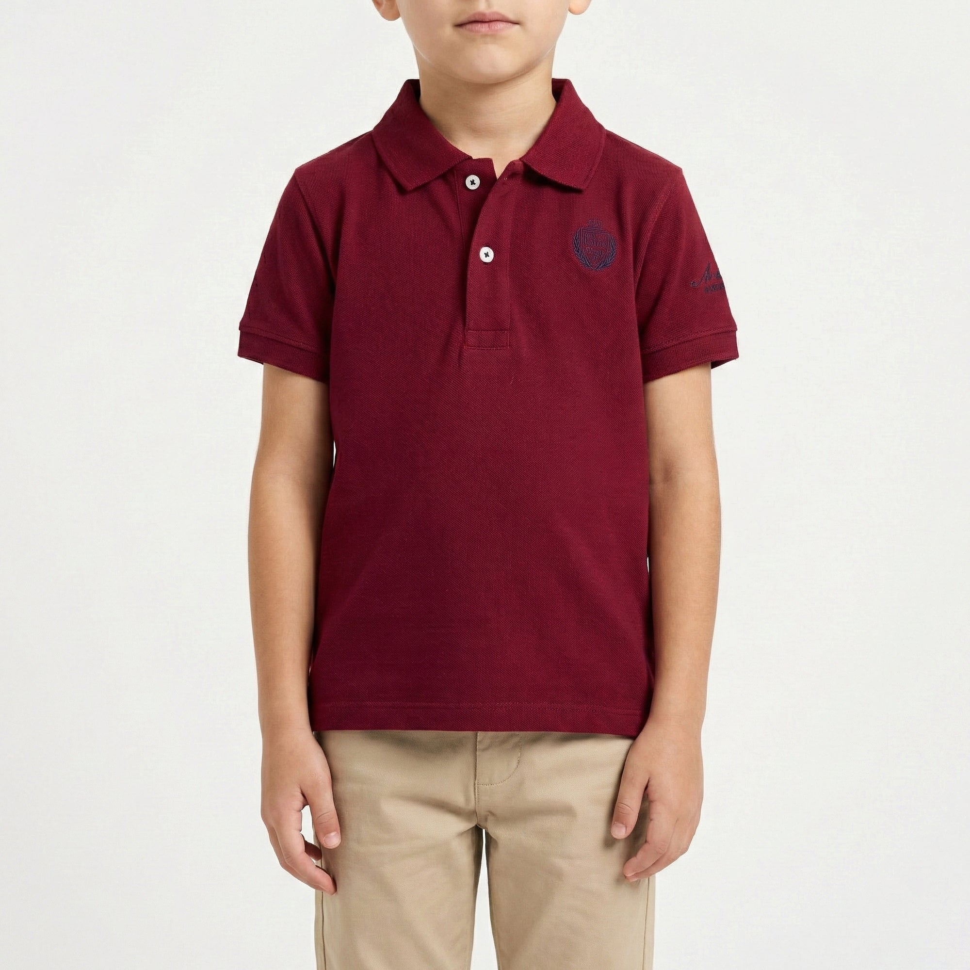 Polo in piquet con logo ricamato sul lato cuore e collo con riga a intarsio