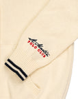 Maglia in caldo cotone con patch ricamata